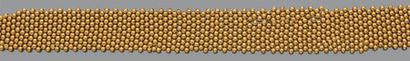 Collier souple en or jaune 18K (750) fait...