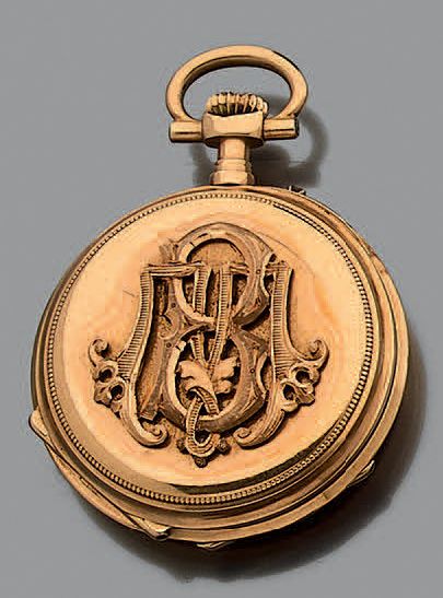 Montre de col à remontoir en or jaune 18K...
