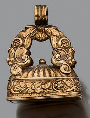 Lot en or jaune 18K (750) composé d'un cachet...