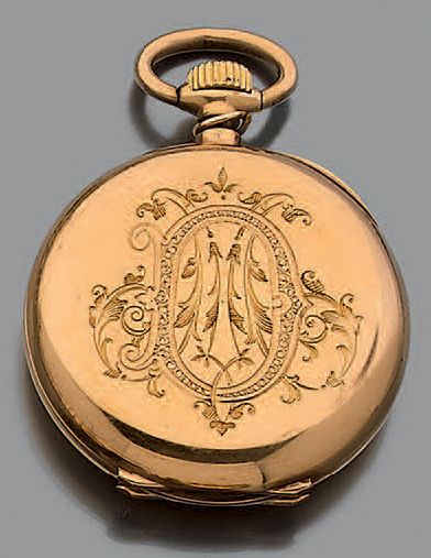Montre de col à remontoir et sa chaînette...
