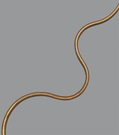 Collier en or jaune 18K (750) formant un...