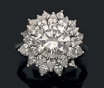Bague en or gris 18K (750) ornée d'un diamant...