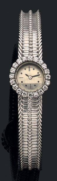 Montre bracelet de dame mécanique en or gris...
