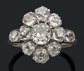 Bague marguerite en platine et or jaune 18K...