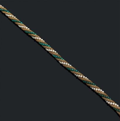 Collier fait d'une torsade d'or jaune 18K...