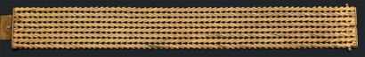 Bracelet ruban souple en or jaune 18K (750)...