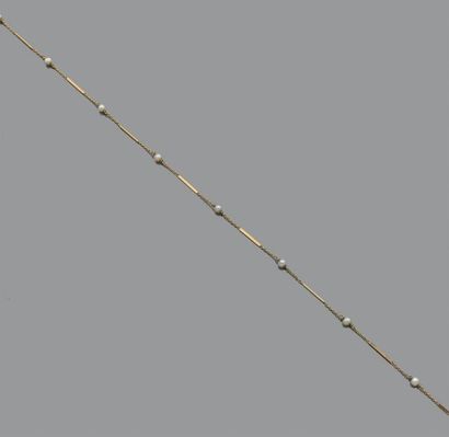 Collier en or jaune 18K (750) à maille forçat...
