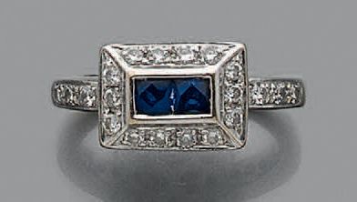 Bague en or gris 18K (750) ornée de deux...