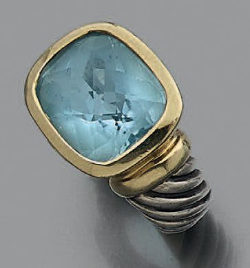 Bague à monture torsadée en or jaune 18K...