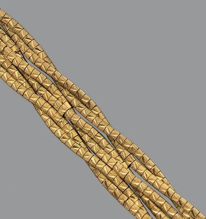 Bracelet en or jaune 18K (750) à six brins...