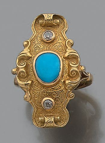 Bague en or jaune 18K (750) à motif oblong...