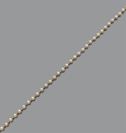 Collier et bracelet de perles de culture...
