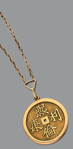 Pendentif rond en or jaune 18K (750) appliqué...