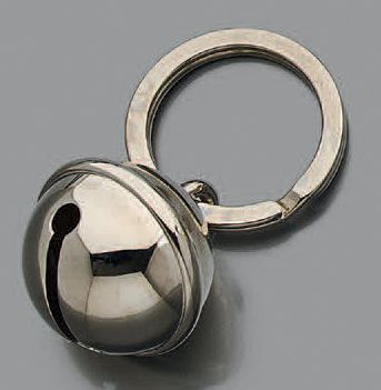 Porte-clef en métal stylisé d'un grelot.
Signé...