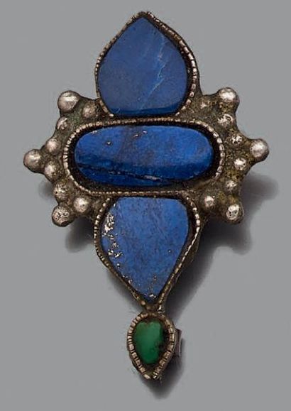 Ensemble composé de:
- une broche en argent...