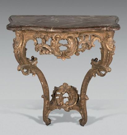Petite console en bois doré, la façade et...