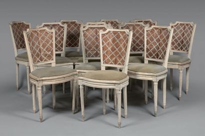 Suite de douze chaises en bois laqué crème,...