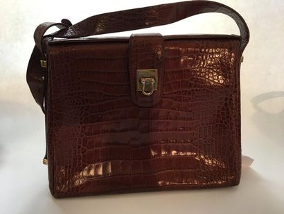 LANCEL. Sac en cuir fauve façon crocodile,...