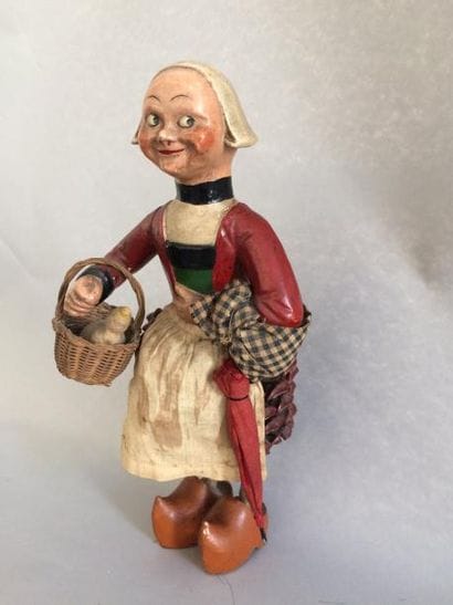 Poupée Bécassine en bois peint, les jambes...