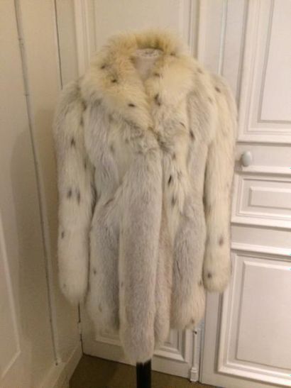 JACQUES AIKER. Veste longue en renard façon...
