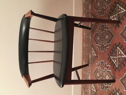 TRAVAIL DANOIS VERS 1970
Fauteuil en palissandre,...