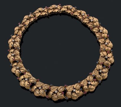 Collier semi-rigide en or jaune 18K (750),...