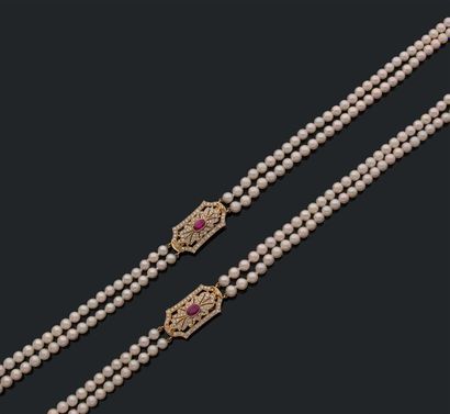 Sautoir double rang de perles de culture...