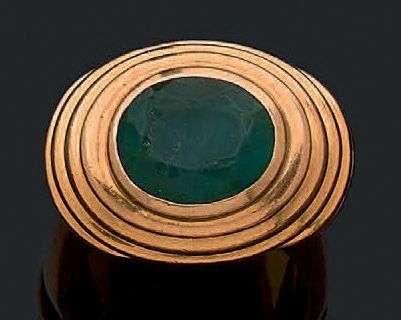 Bague demi-jonc en or jaune godronné 18K...