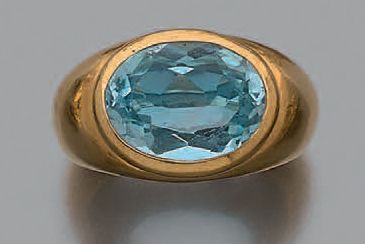 Bague demi-jonc en or jaune 18K (750), ornée...