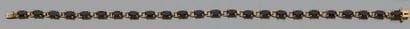 Bracelet en or jaune 18K (750), articulé...