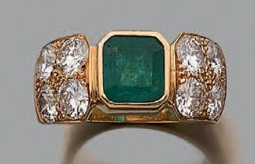 Bague en or jaune 18K (750), à deux spatules...