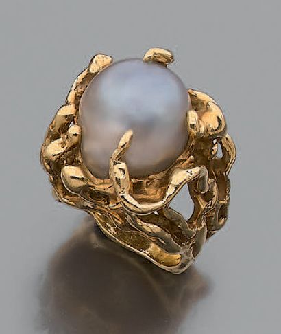 * Bague en or jaune 18K (750), à l'imitation...