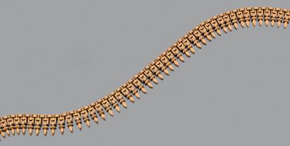 * Collier en or jaune 18K (750), articulé...