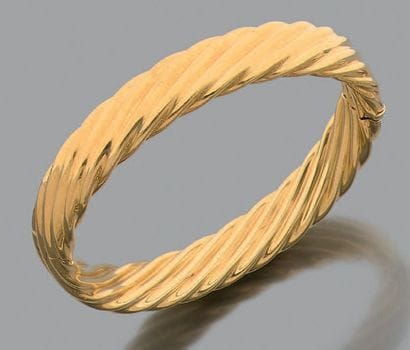 Bracelet rigide ouvrant en or jaune 18K (750),...