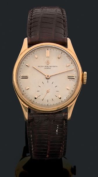 Montre d'homme, le boîtier en or jaune 18K...