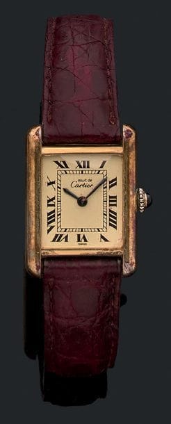 * Montre bracelet de dame «Tank» en argent...