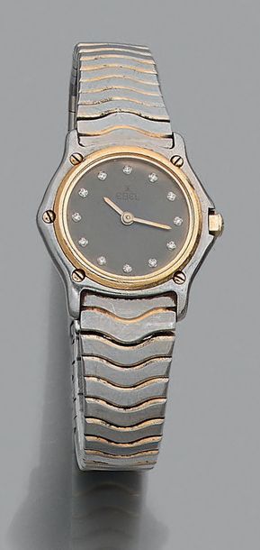 Montre bracelet de dame en acier et or jaune...