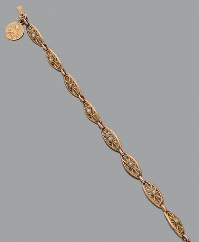 Bracelet en or jaune 18K (750), articulé...