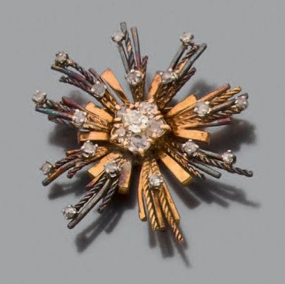 Broche en or jaune 18K (750), stylisée d'un...