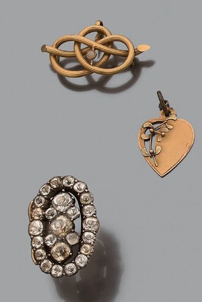 * Lot en or jaune 18K (750) et argent, composé...
