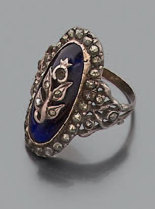 Bague en argent, argent doré et acier poli...