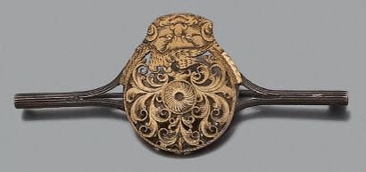 Ensemble composé de:
- une broche à monture...