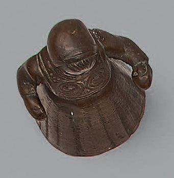 Clochette en bronze figurant une fillette.
Haut.:...