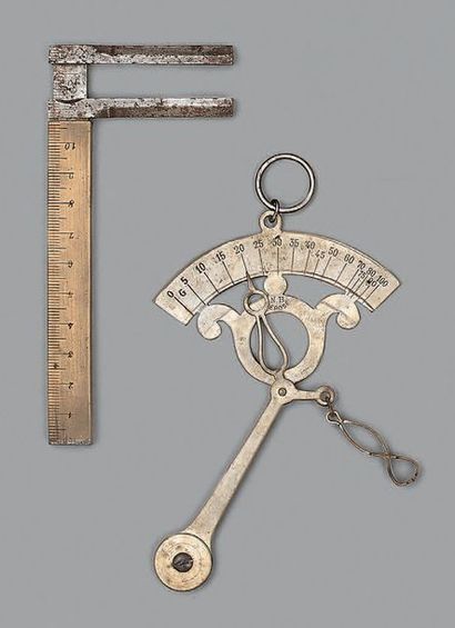 Deux instruments de mesure: un pied à coulisse...