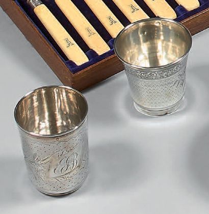 Deux timbales gravées en argent (950), une...