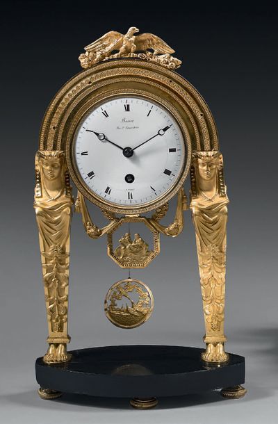 Pendule portique en bronze ciselé et doré,...