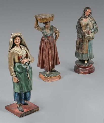 Trois statuettes de santons napolitains représentant:
-...