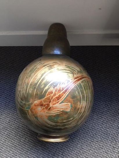 GRÜNE H.
Large metal vase of ovoid shape....