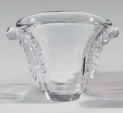 DAUM
Three glass vases, one smoked, the second...