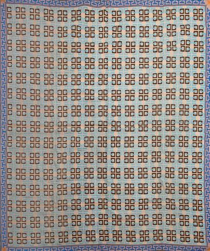 Tapis aux gros points sur un canevas, probablement...